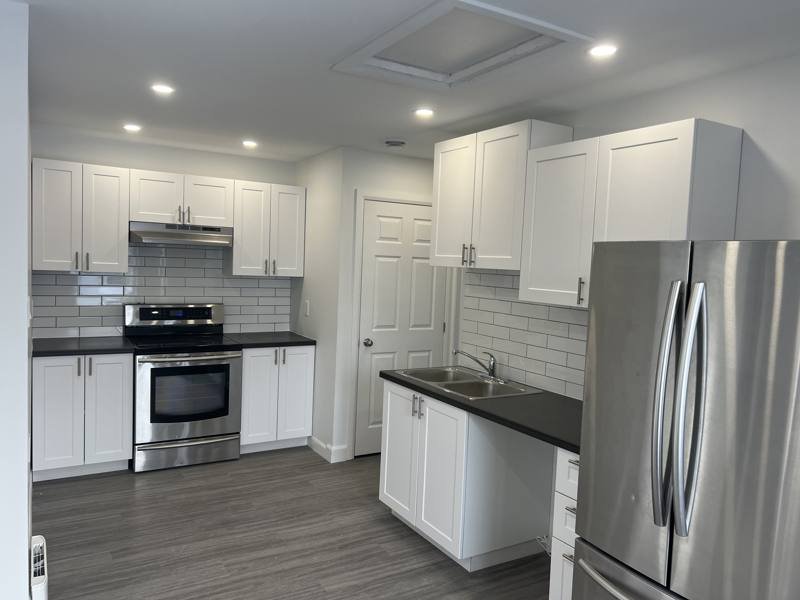 Finished kitchen in one of the triplex units